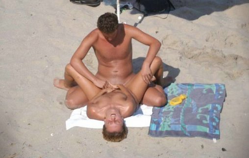 Amateur couple is having sex on the beach