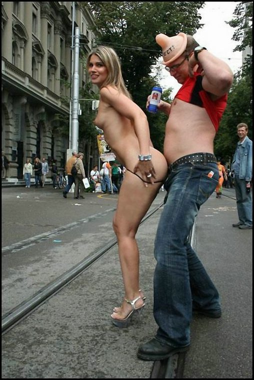 Sexy Woman Nude At Parade Teases Drunk Man Photo